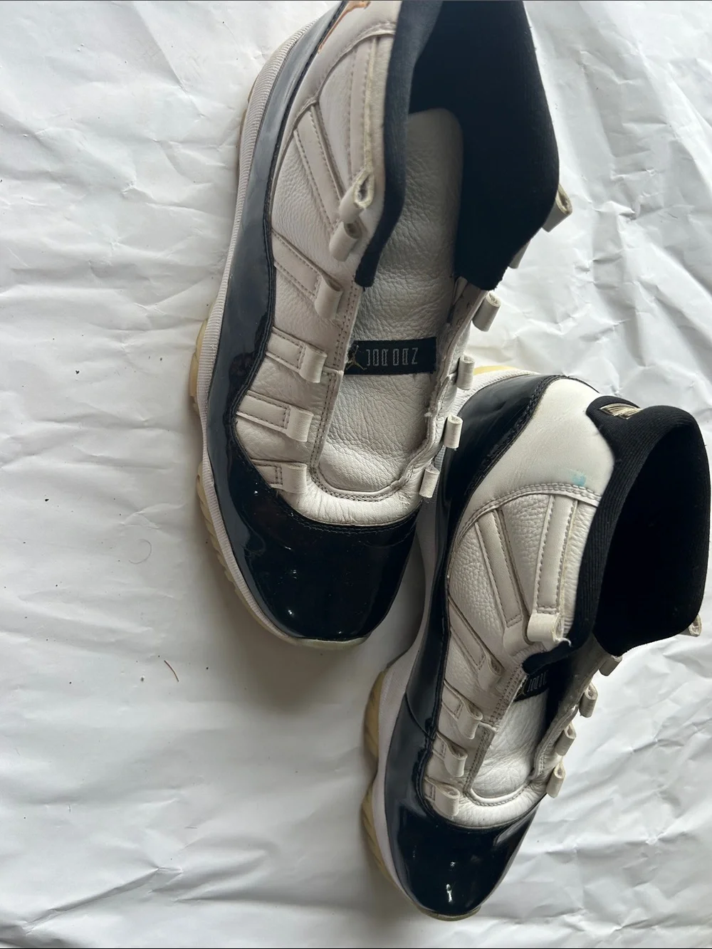 Jordan Black and White Patent Leather Sneakers